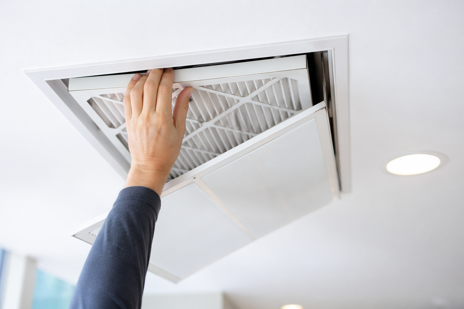 Changing ceiling air filter